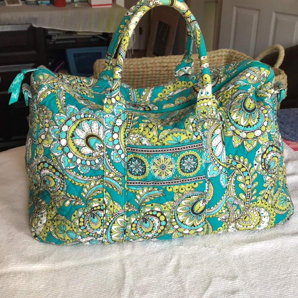 Then multi colored travel bag, Vera Bradley